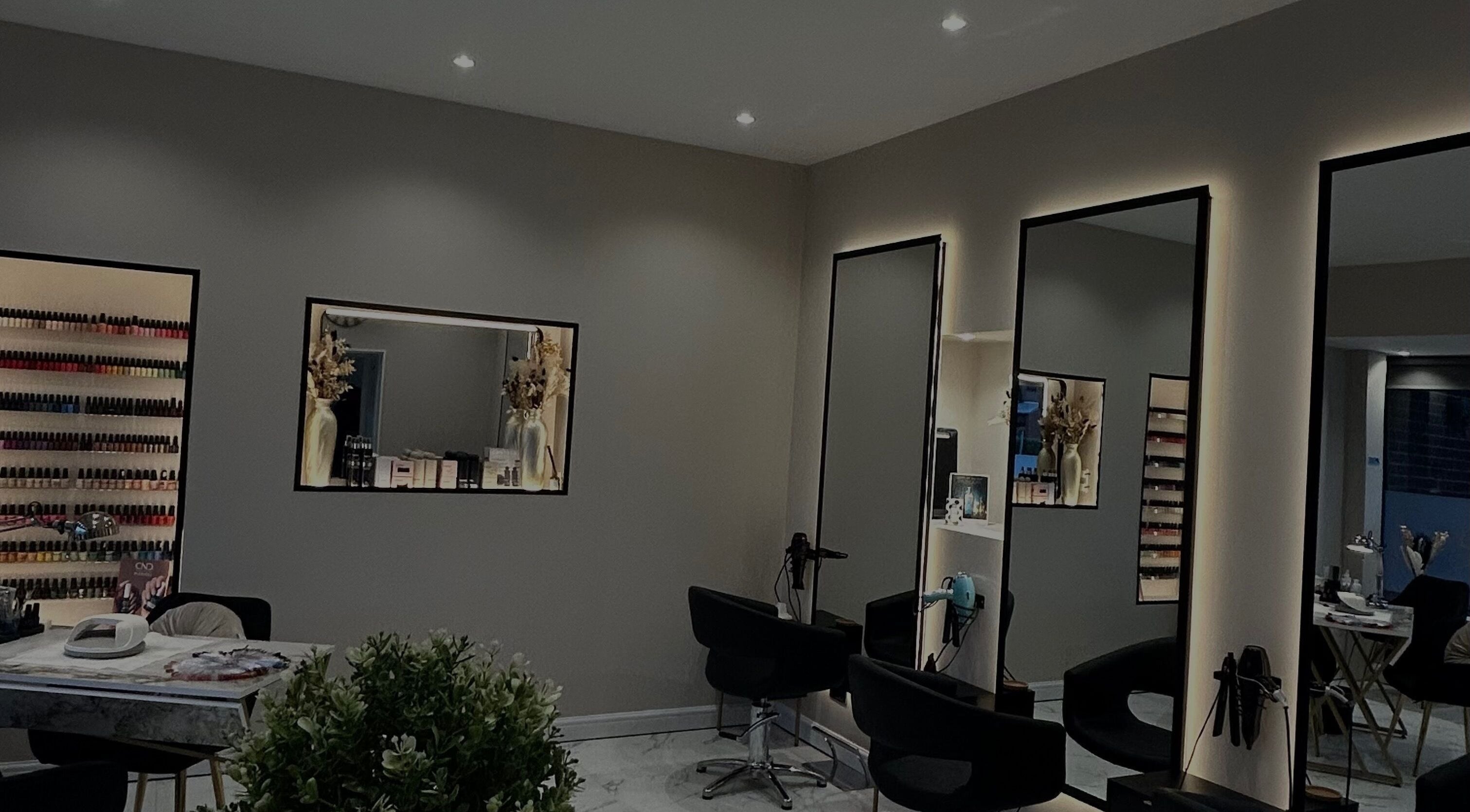 Sophisticated salon interior at Welburn Hall, Cottingham, England, GB with stylish seating and decor.