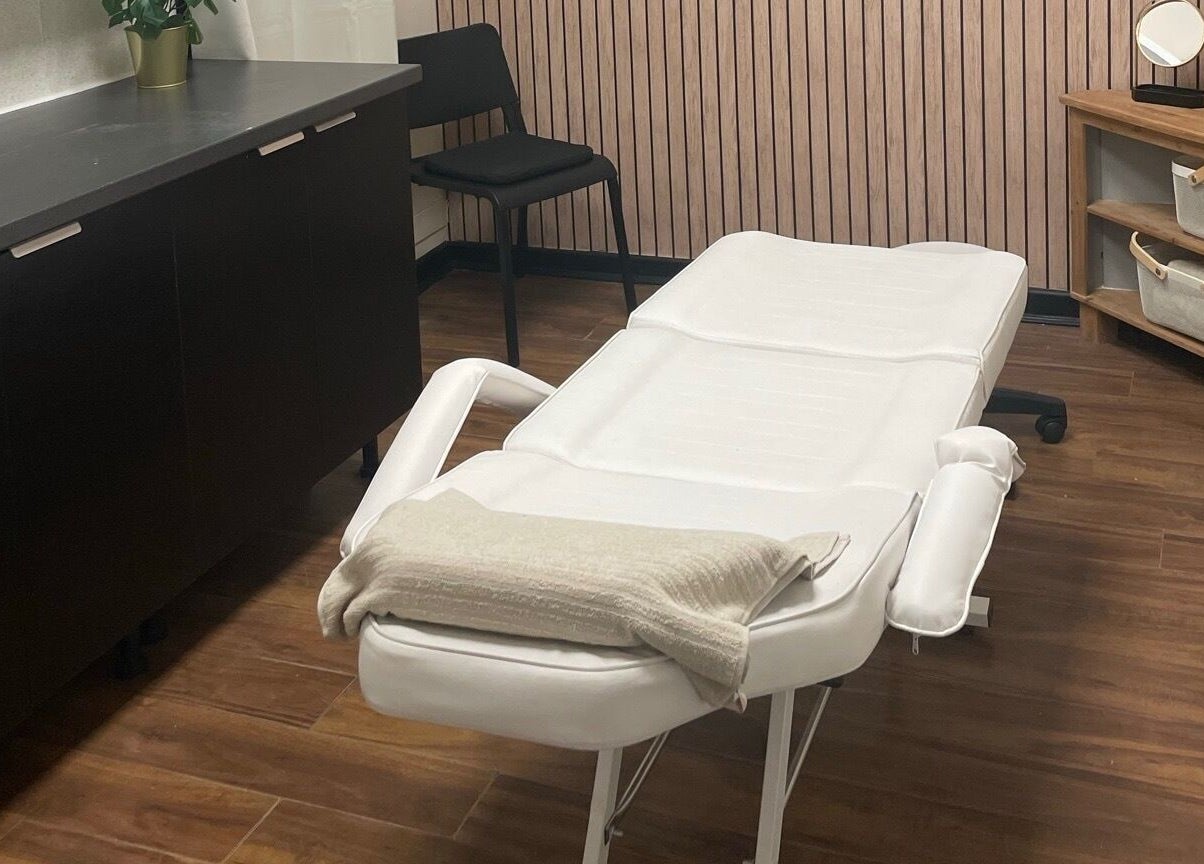 Elegant treatment room at Studio 11 Nails and Beauty, Oakdale Caerphilly, Wales, GB showcasing a comfortable massage bed.