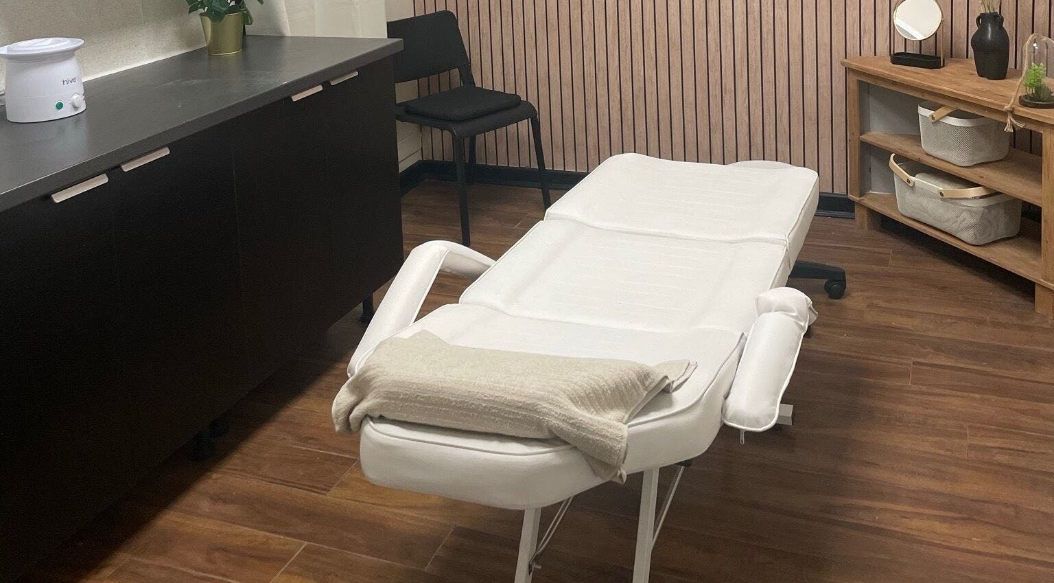 Elegant treatment room at Studio 11 Nails and Beauty, Oakdale Caerphilly, Wales, GB showcasing a comfortable massage bed.
