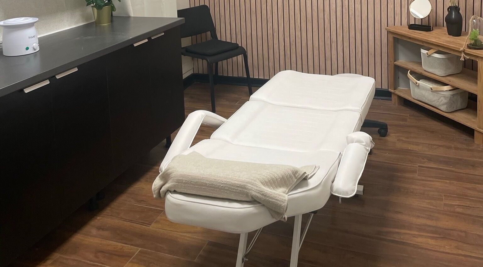 Elegant treatment room at Studio 11 Nails and Beauty, Oakdale Caerphilly, Wales, GB showcasing a comfortable massage bed.