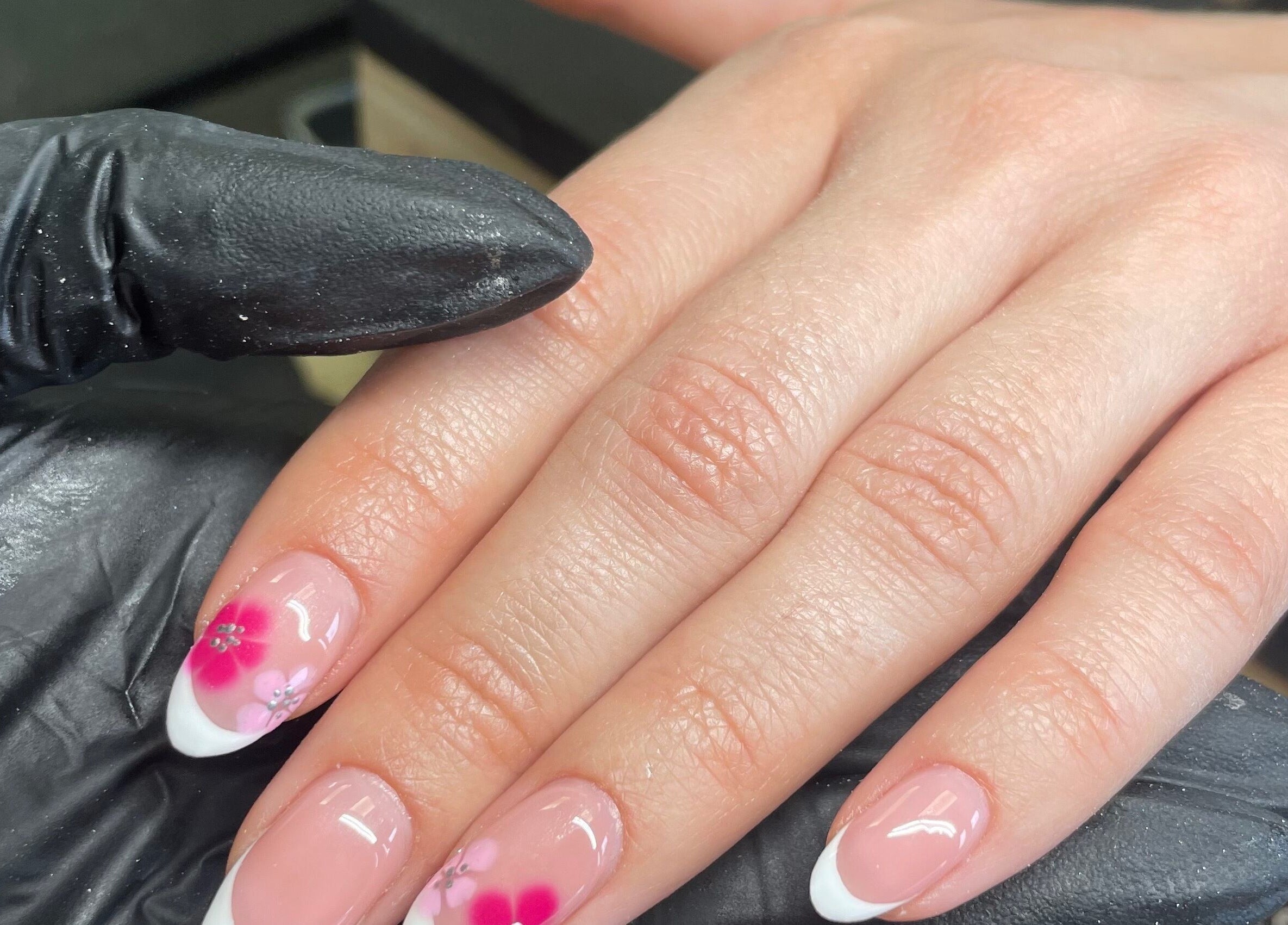 Elegant floral nail art at Studio 11 Nails and Beauty, Oakdale Caerphilly, Wales, GB. Perfect for a stylish look.