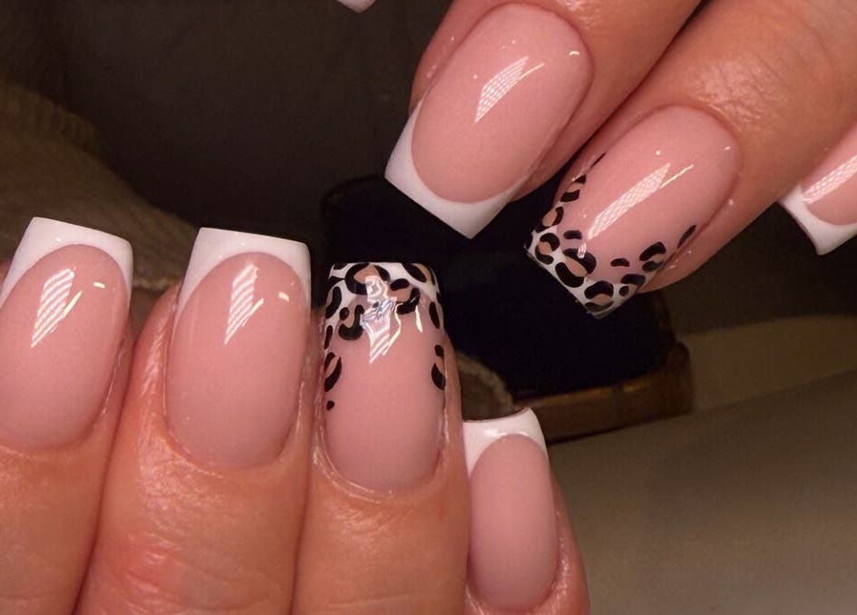 Chic leopard and French manicure at Keep It Cassie, Hucclecote, England, GB. Perfect for stylish nail art lovers.