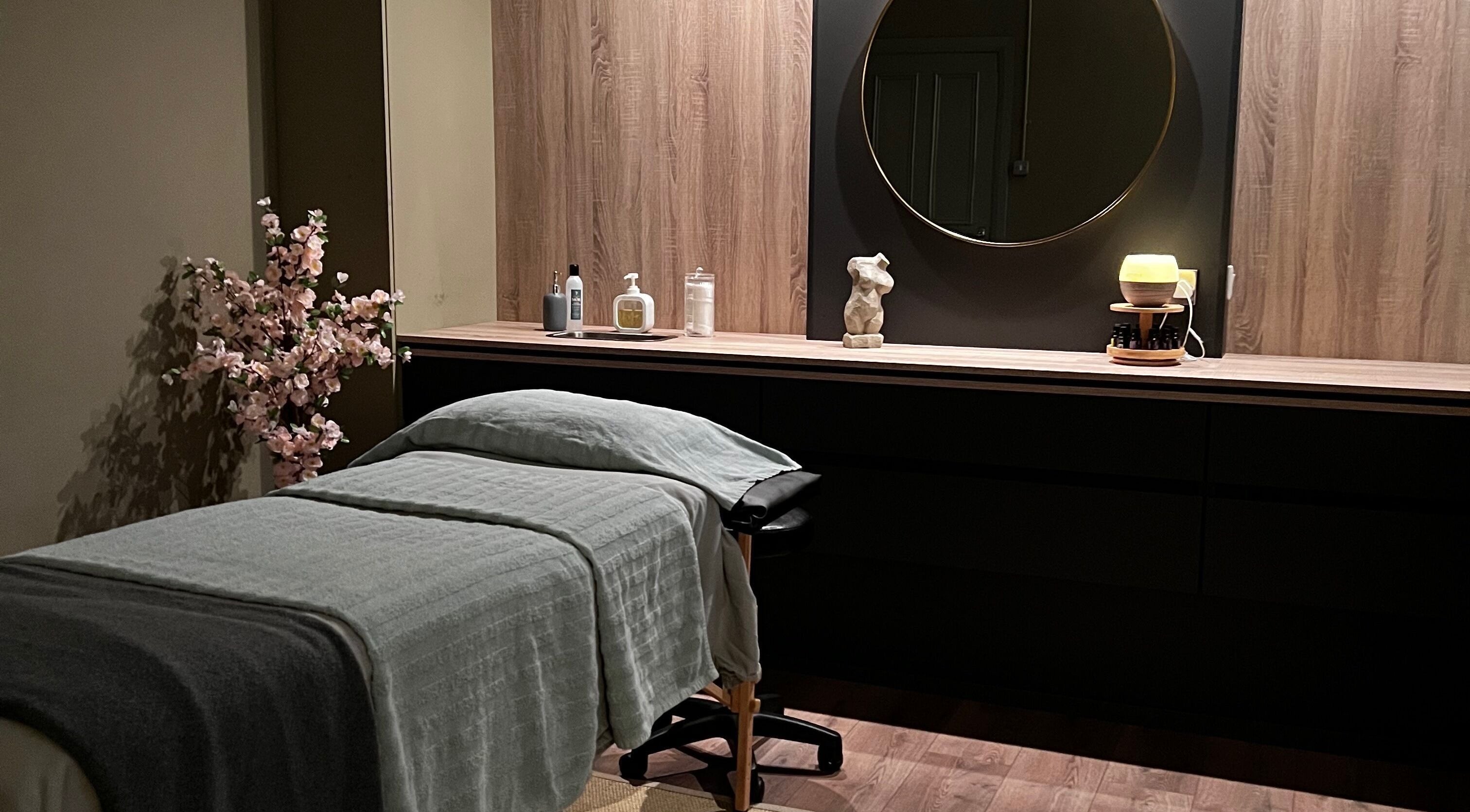 Cozy Brazilian Massage room with soft bed and decor in Waterford, County Waterford, IE.
