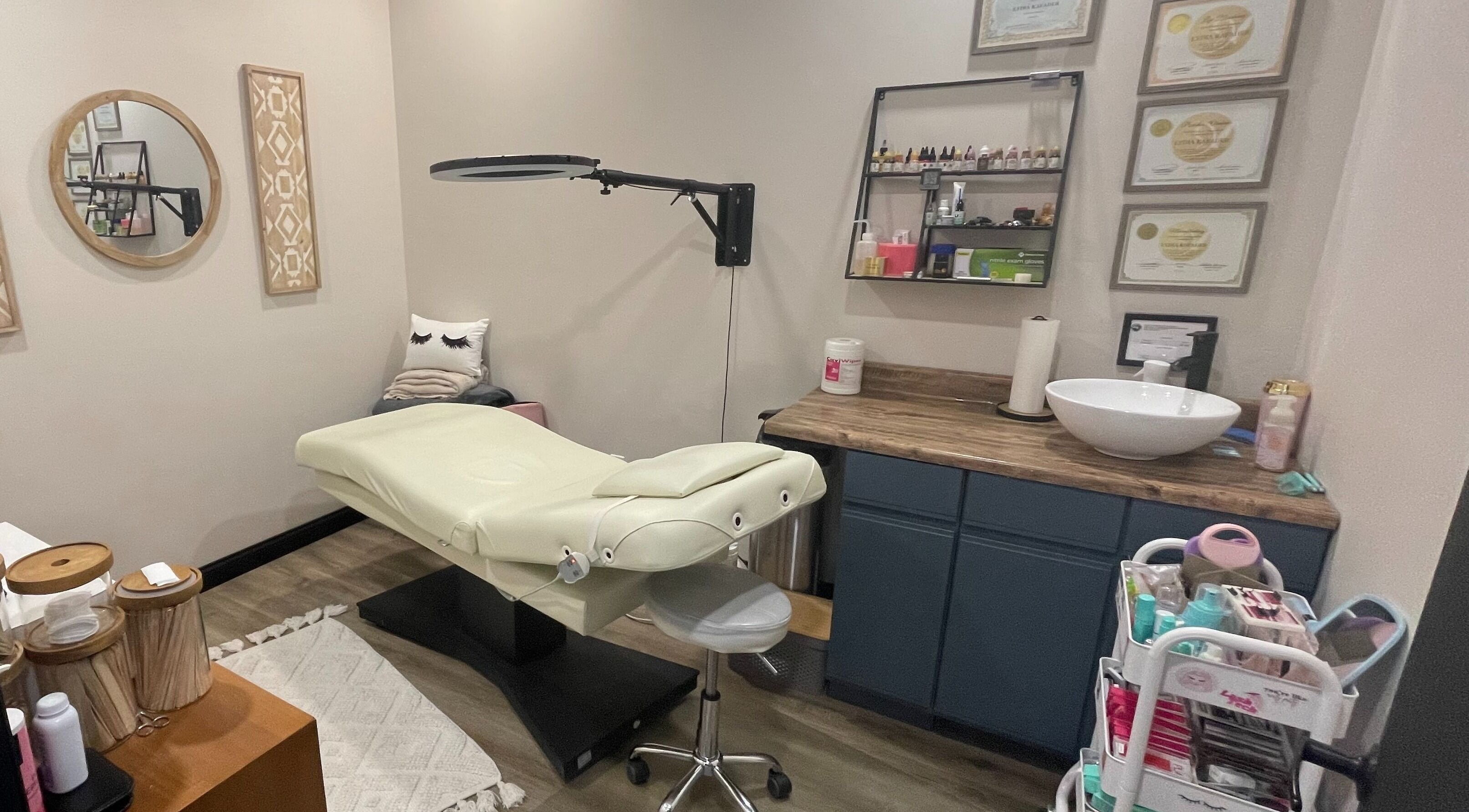 Luxe treatment room at Lumi Lasers and Aesthetics, Crown Point, Indiana, US, featuring a plush bed and serene decor.