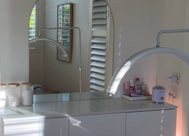 Bright treatment room at Brow Stance, Bli Bli, Queensland, AU features sleek modern design and beauty essentials.