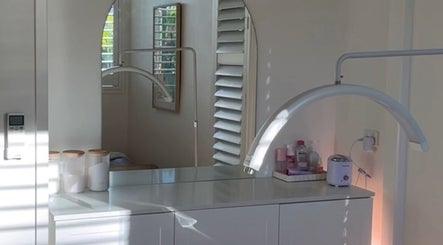 Bright treatment room at Brow Stance, Bli Bli, Queensland, AU features sleek modern design and beauty essentials.