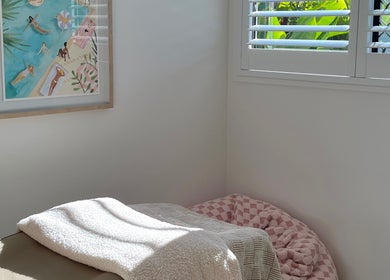 Relaxing corner at Brow Stance, Bli Bli, Queensland, AU with plush decor and soft lighting.