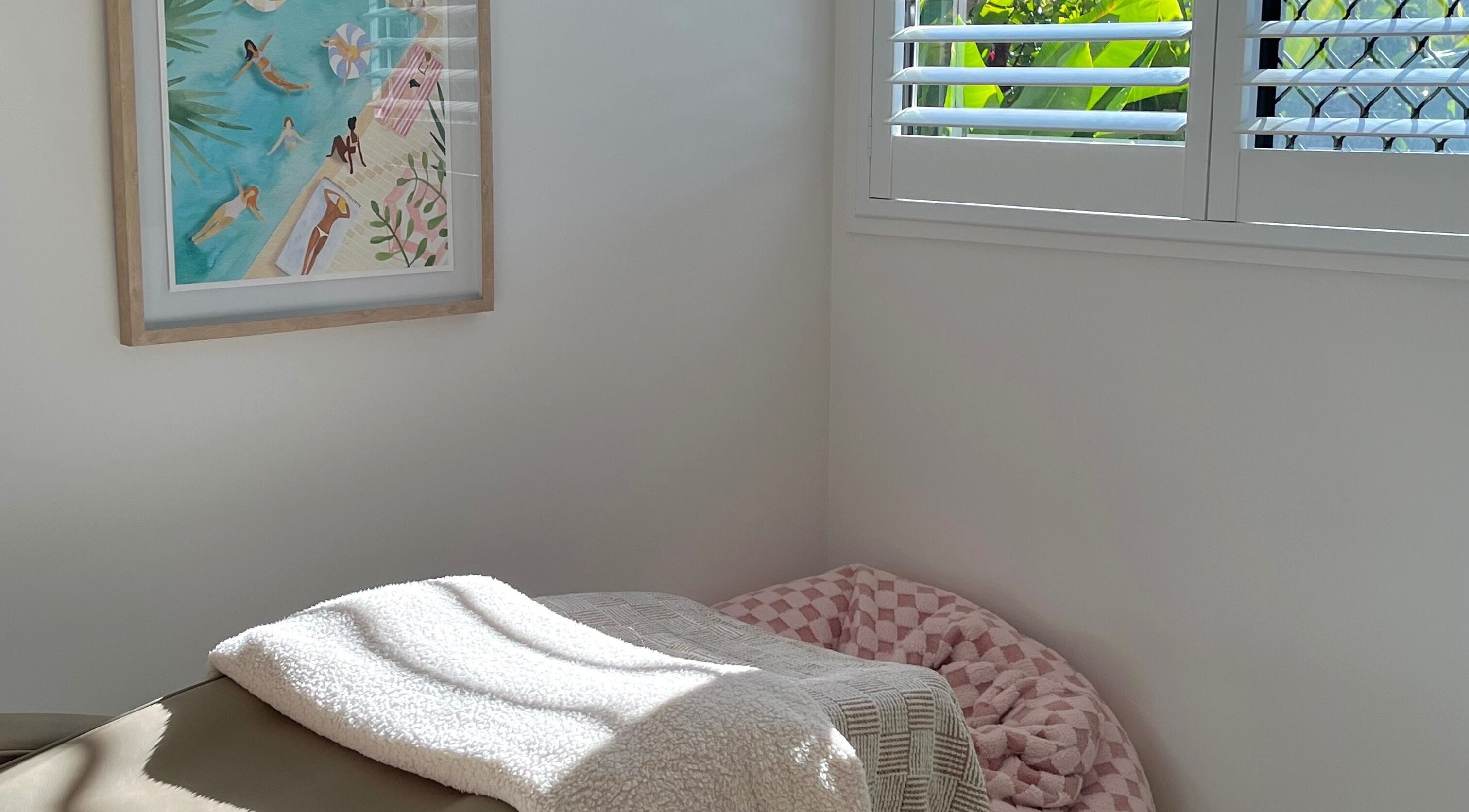 Relaxing treatment room at Brow Stance, Bli Bli, Queensland, AU with warm decor and serene ambiance.