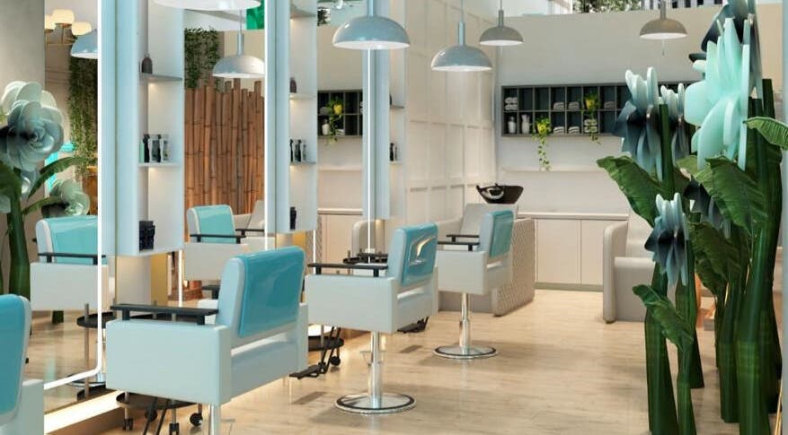 Stylish interior of Alina Beauty Space in Dubai, AE, featuring elegant salon chairs and lush green decor.