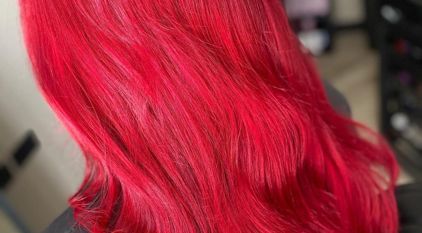 Vibrant red hair transformation at FabYouLocks, Motherwell, Scotland, GB salon enriches beauty experience.