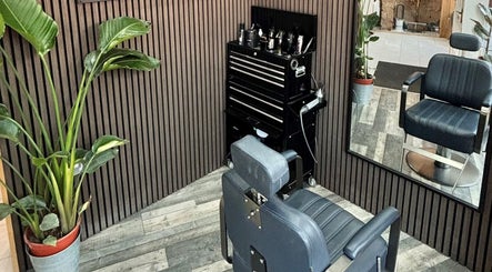 Modern barber chair in RM Barbering at Stockton-on-tees, England, GB. Stylish and contemporary setup.