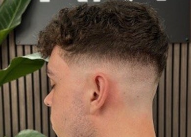 Close-up of a stylish fade haircut at RM Barbering in Stockton-on-Tees, England, GB.