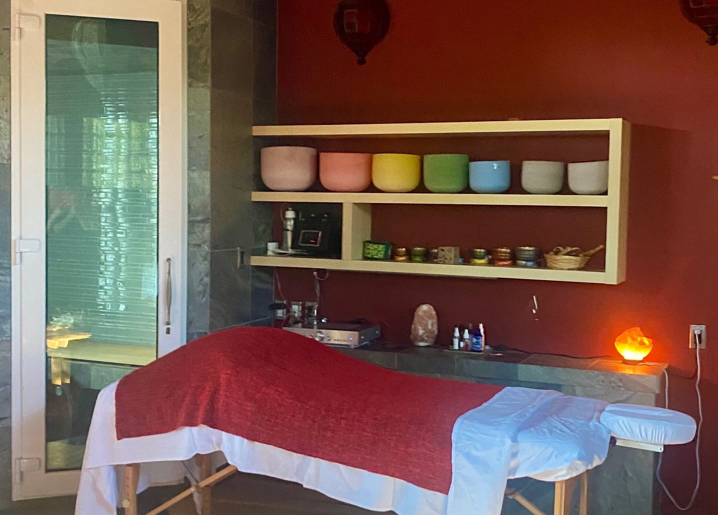 Massage room at Freedom Spa Mobile - Bali Casa in Halfmoon Bay, BC, CA with therapeutic furnishings.