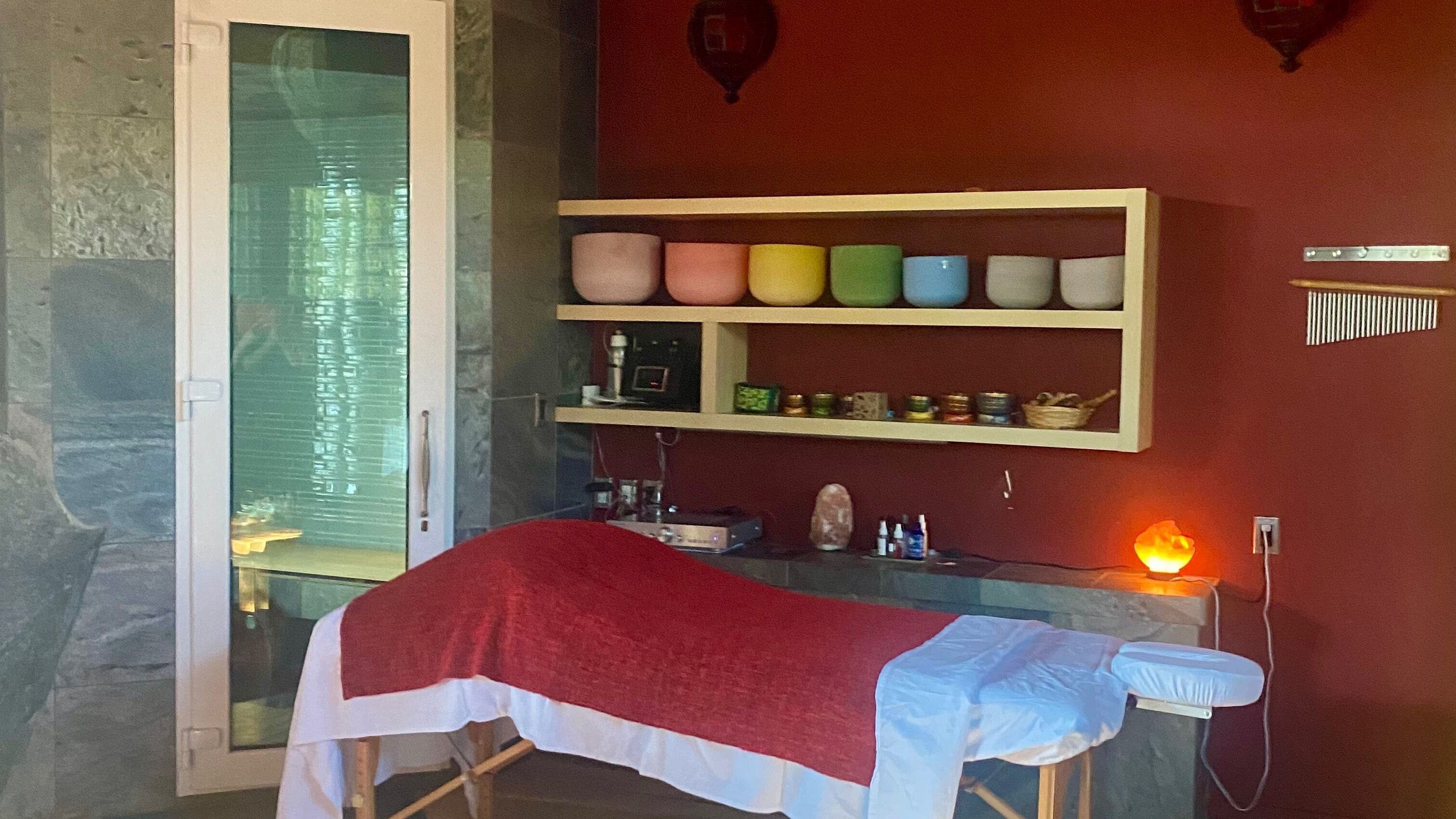 Massage room at Freedom Spa Mobile - Bali Casa in Halfmoon Bay, BC, CA with therapeutic furnishings.