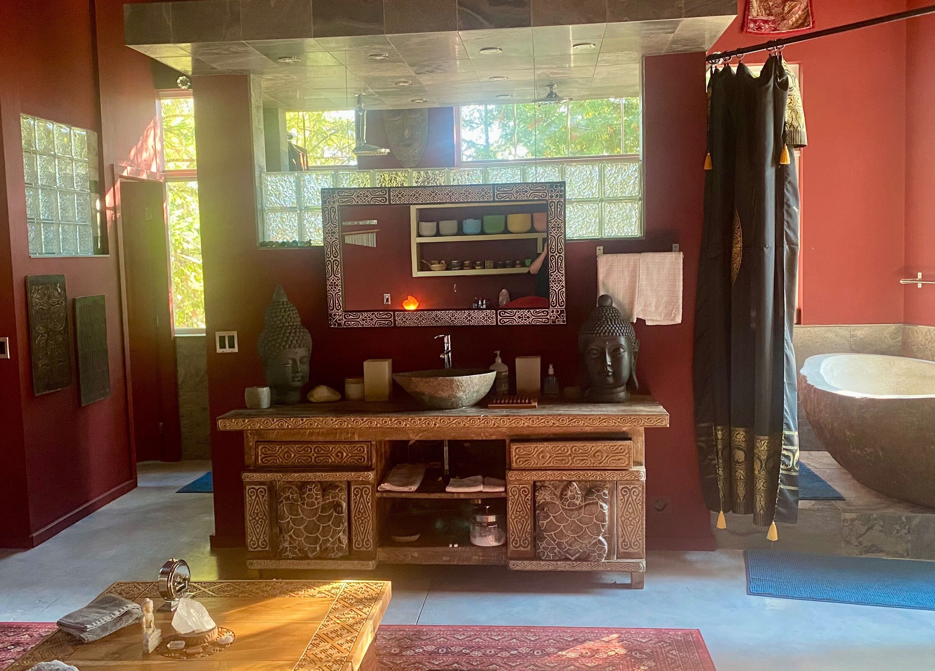 Elegant spa interior at Freedom Spa Mobile - Bali Casa in Halfmoon Bay, BC, featuring a rustic washroom setup.