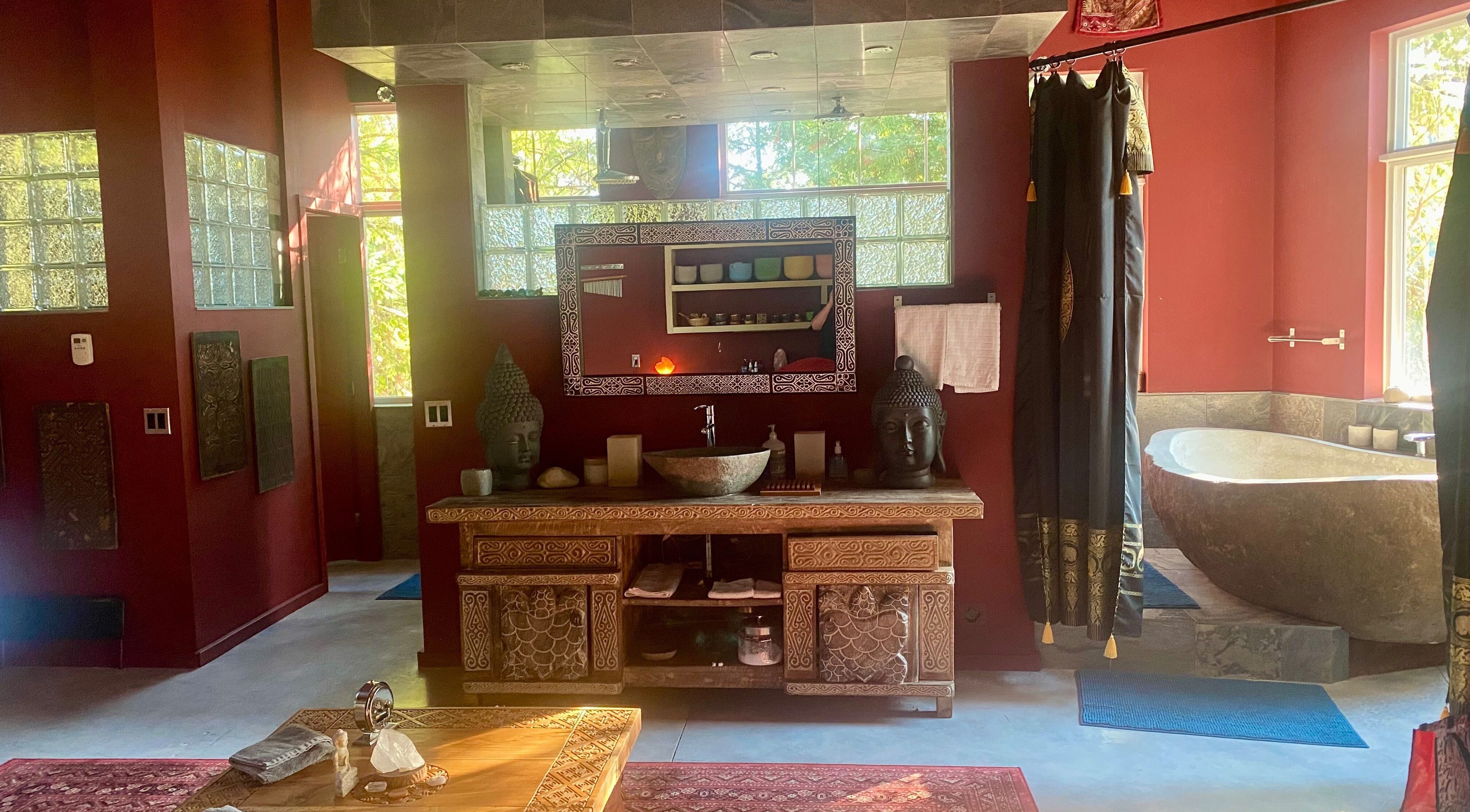 Elegant spa interior at Freedom Spa Mobile - Bali Casa in Halfmoon Bay, BC, featuring a rustic washroom setup.
