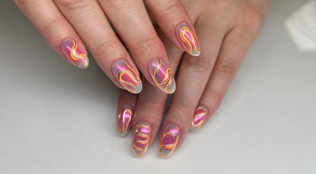 Colorful swirl nail art design at Cindy's Nails, Denver, Colorado, US.