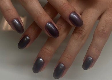 Beautiful dark manicured nails at Cindy's Nails, Denver, Colorado, US.