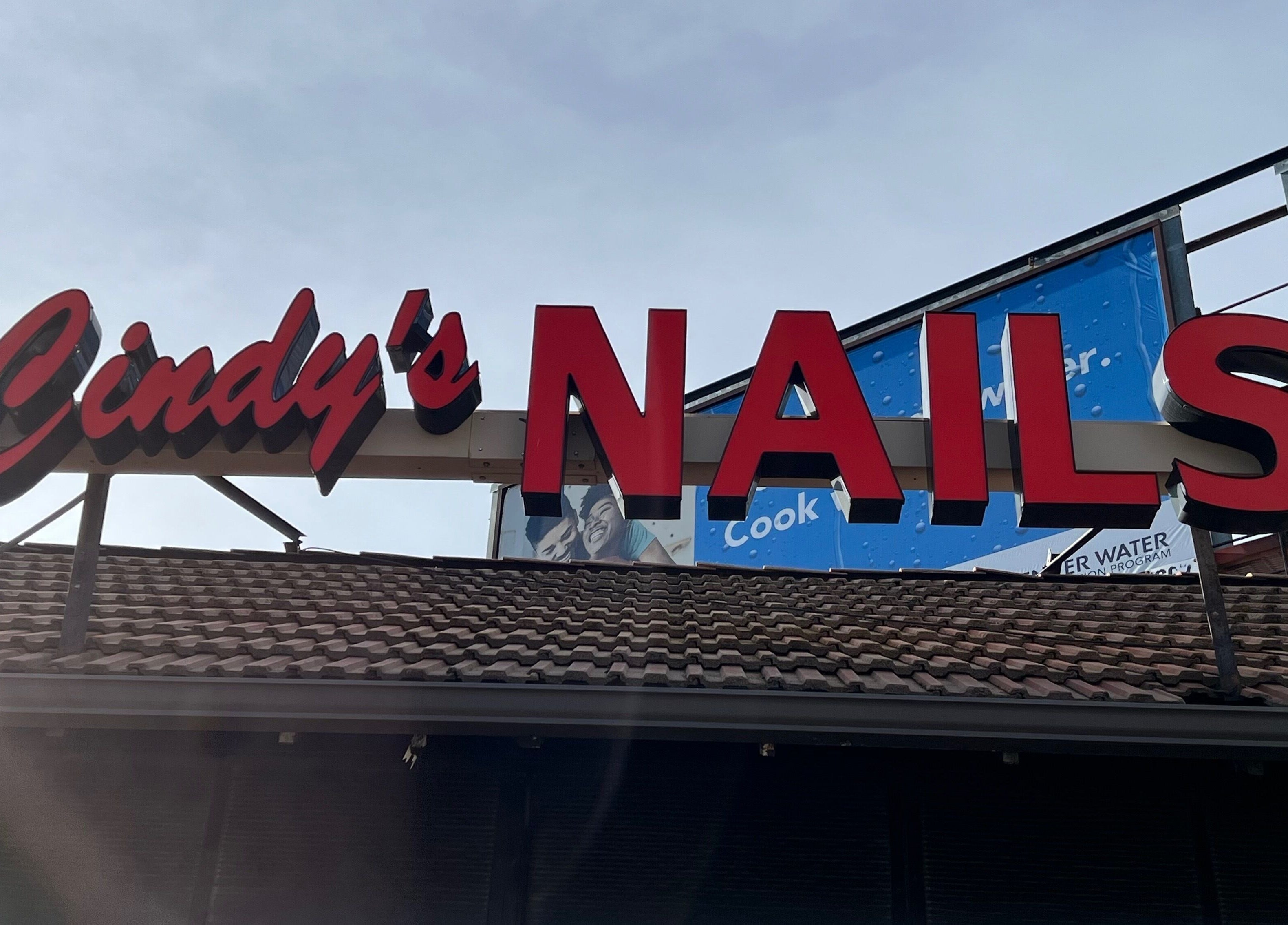Cindy's Nails storefront sign, a beauty and wellness venue in Denver, Colorado, US.