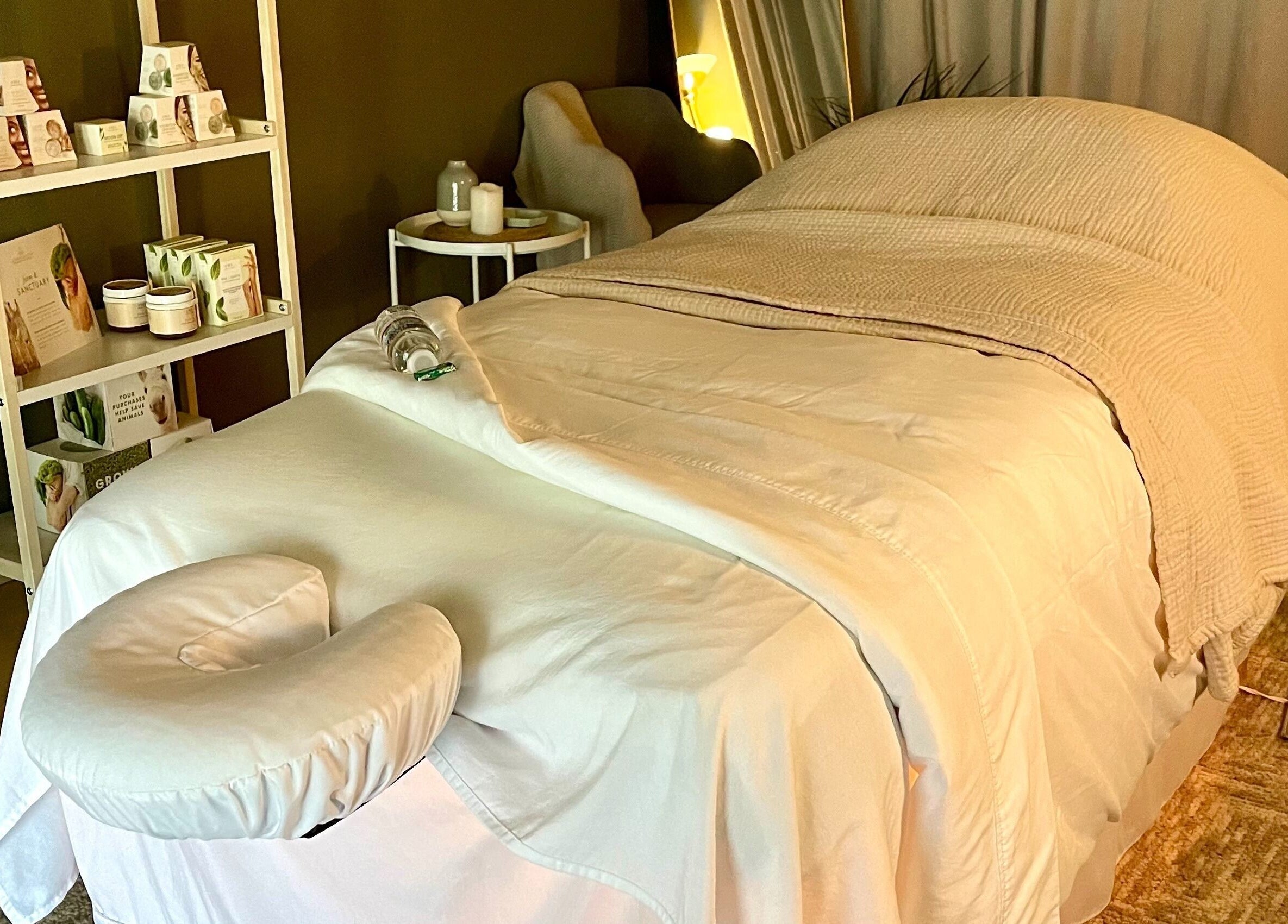 Relaxing massage room at The June Massage and Skin Studio, Monroe, Washington, US with calming decor.