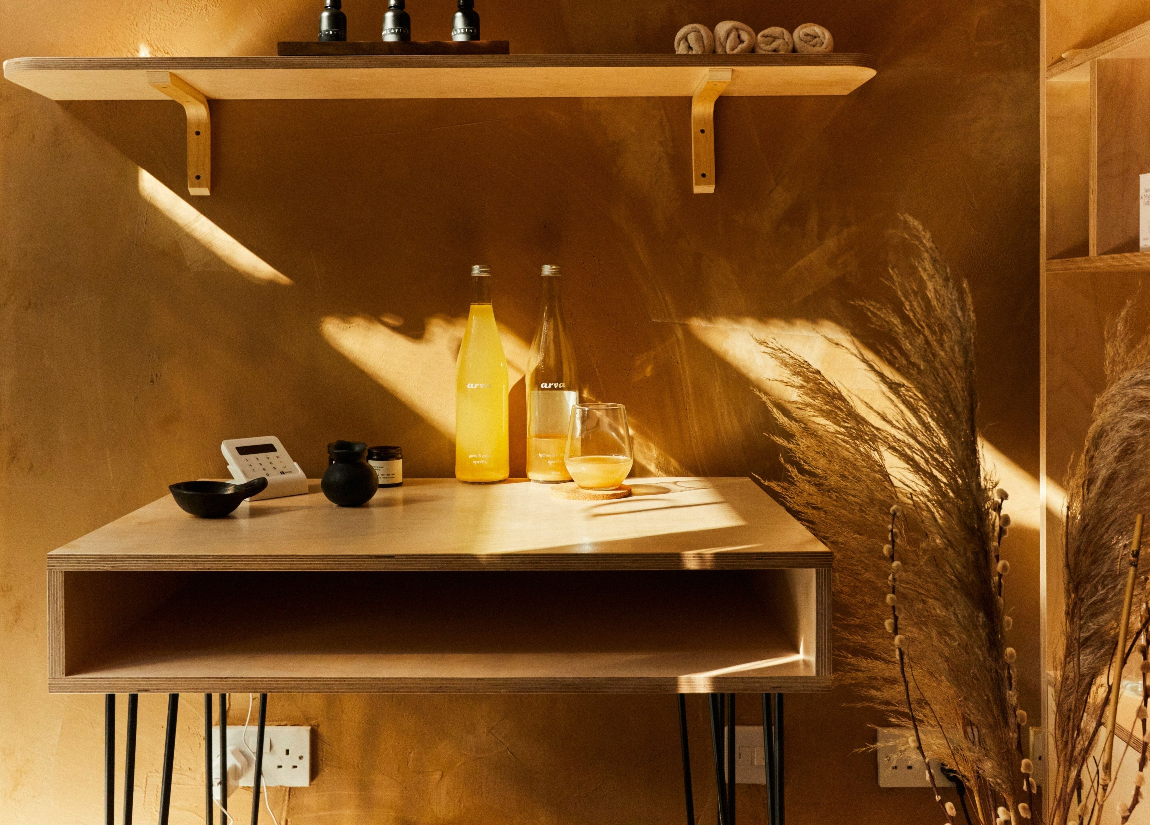 Warm, earthy decor at Bodied in London, England, GB exudes a calming ambiance for wellness experiences.