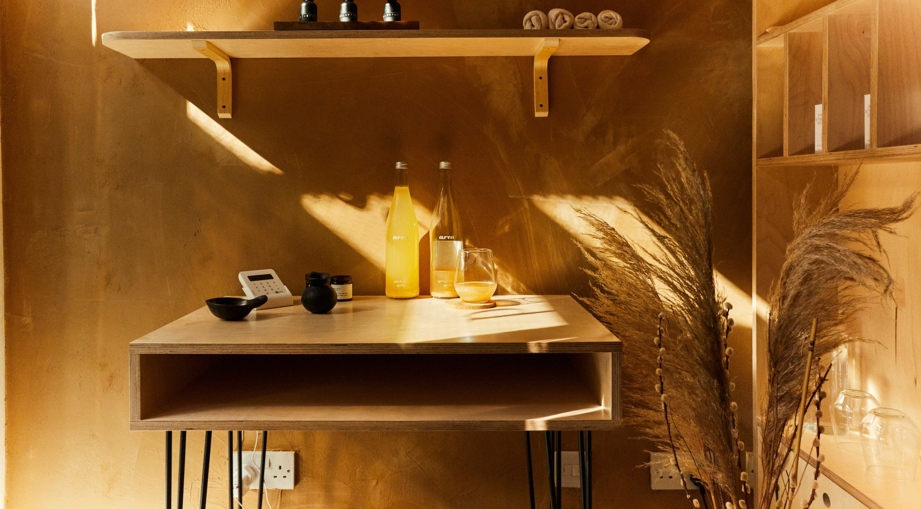 Warm, earthy decor at Bodied in London, England, GB exudes a calming ambiance for wellness experiences.