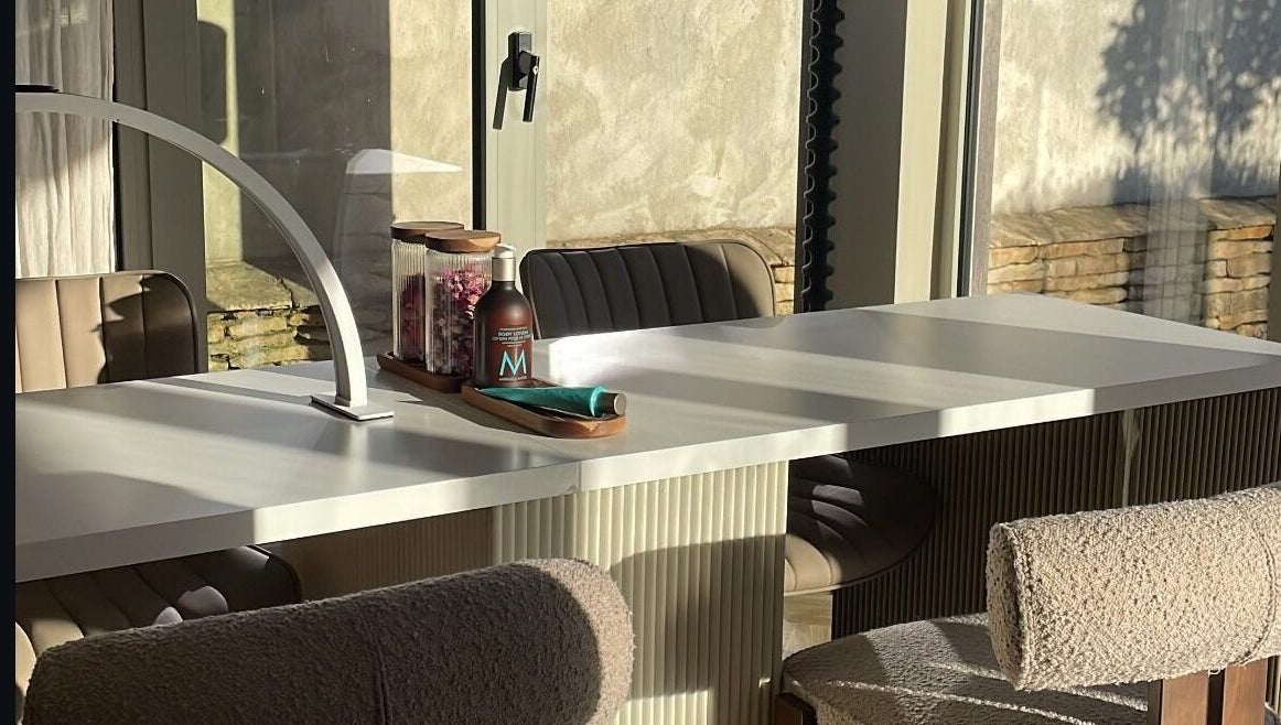 Modern nail salon table at Moonlight Nails By Meg At Elkstone, England, GB, bathed in natural sunlight.