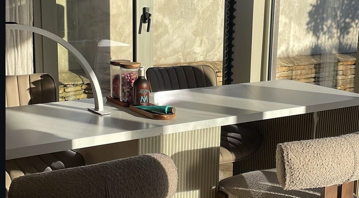 Modern nail salon table at Moonlight Nails By Meg At Elkstone, England, GB, bathed in natural sunlight.