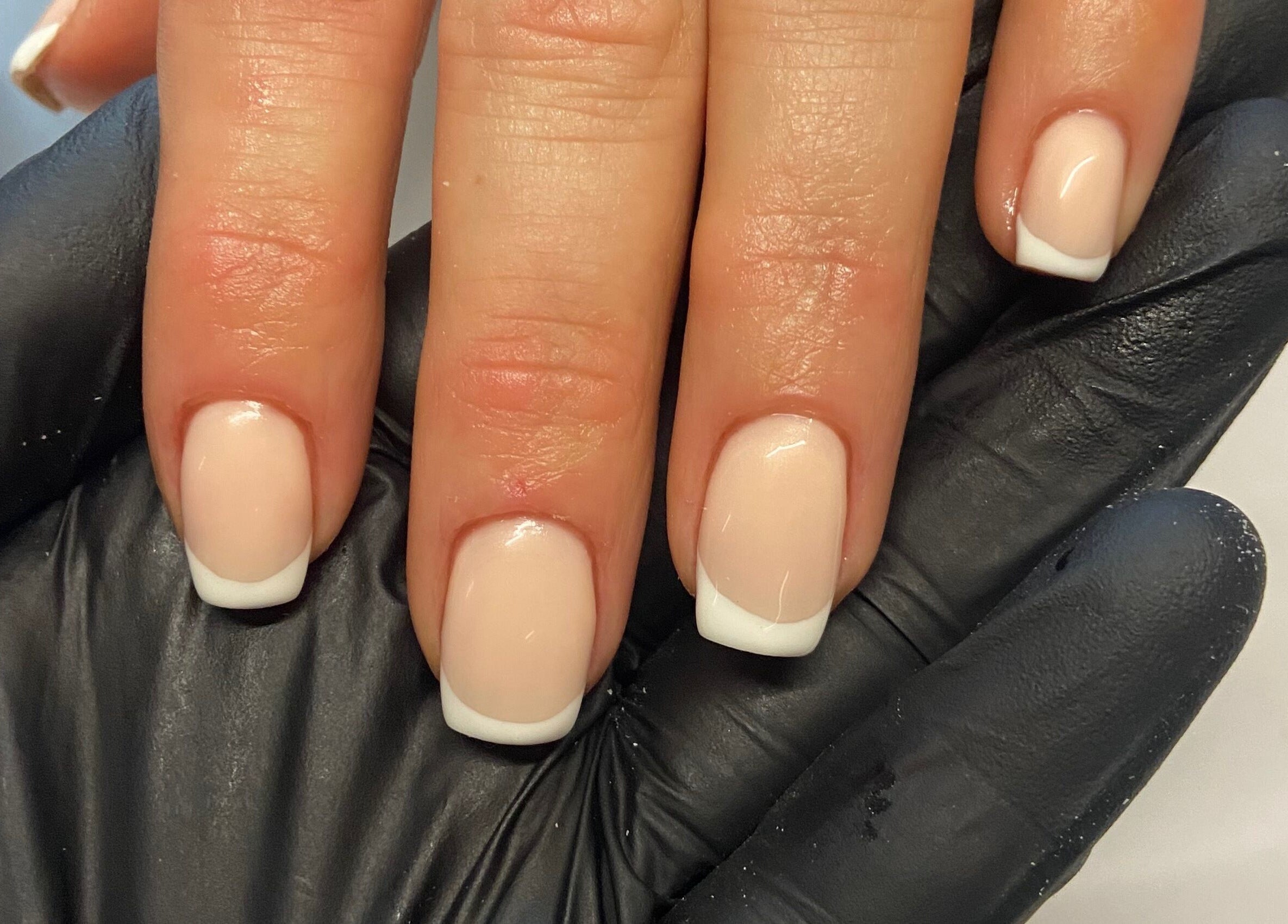 Elegant French manicure at Moonlight Nails By Meg At Elkstone, Elkstone, England, GB. Perfect glossy finish.