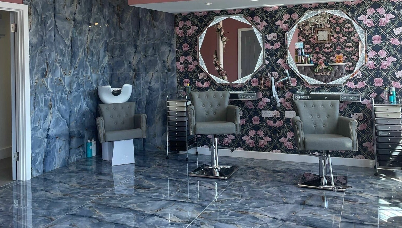 Chic interior of Princess Glam and Locks, Roche Cornwall, at St Austell, England, GB with styling chairs and mirrors.