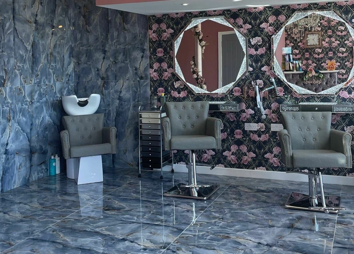 Chic interior of Princess Glam and Locks, Roche Cornwall, at St Austell, England, GB with styling chairs and mirrors.