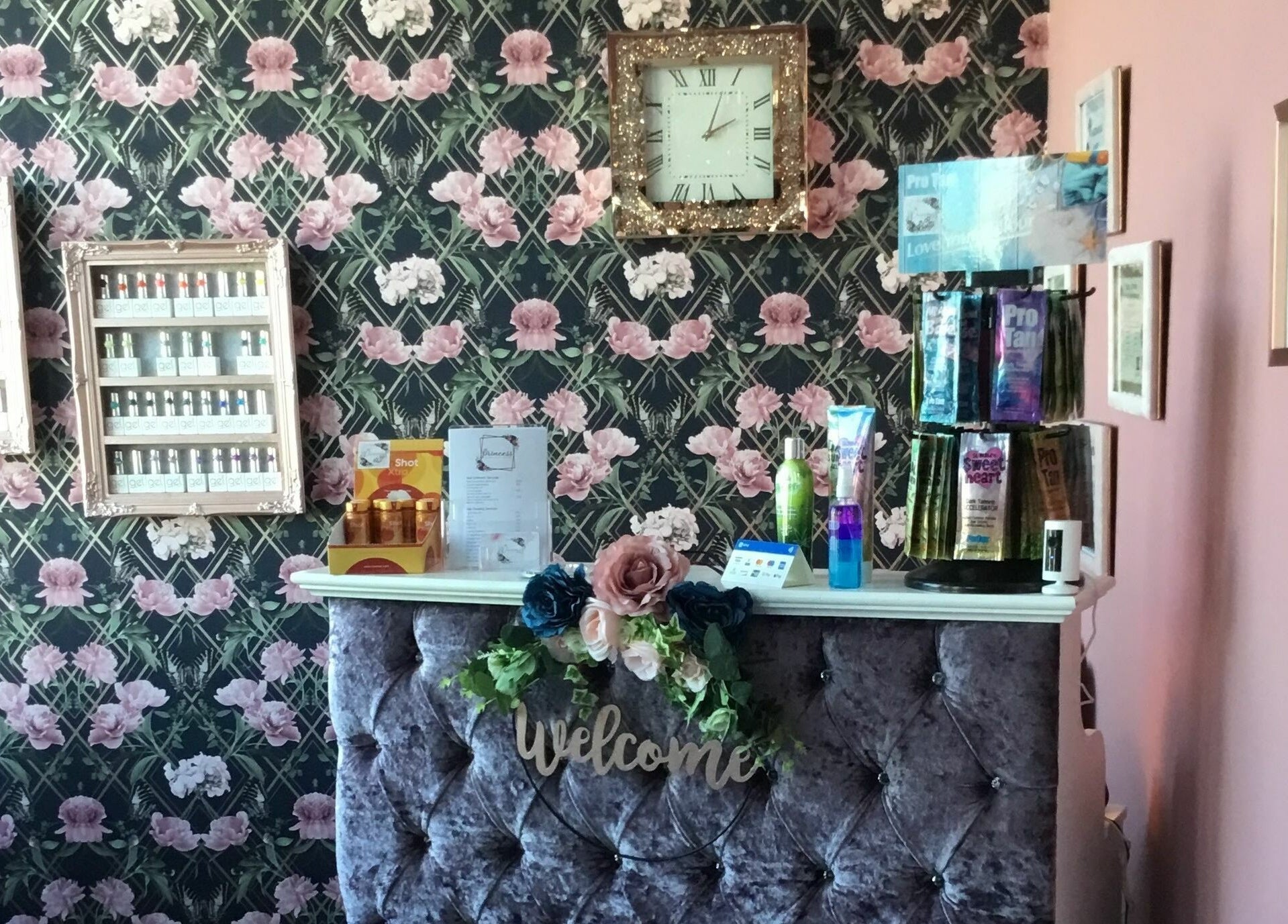 Reception area at Princess Glam and Locks, Roche Cornwall, showcasing floral decor in St Austell, England, GB.