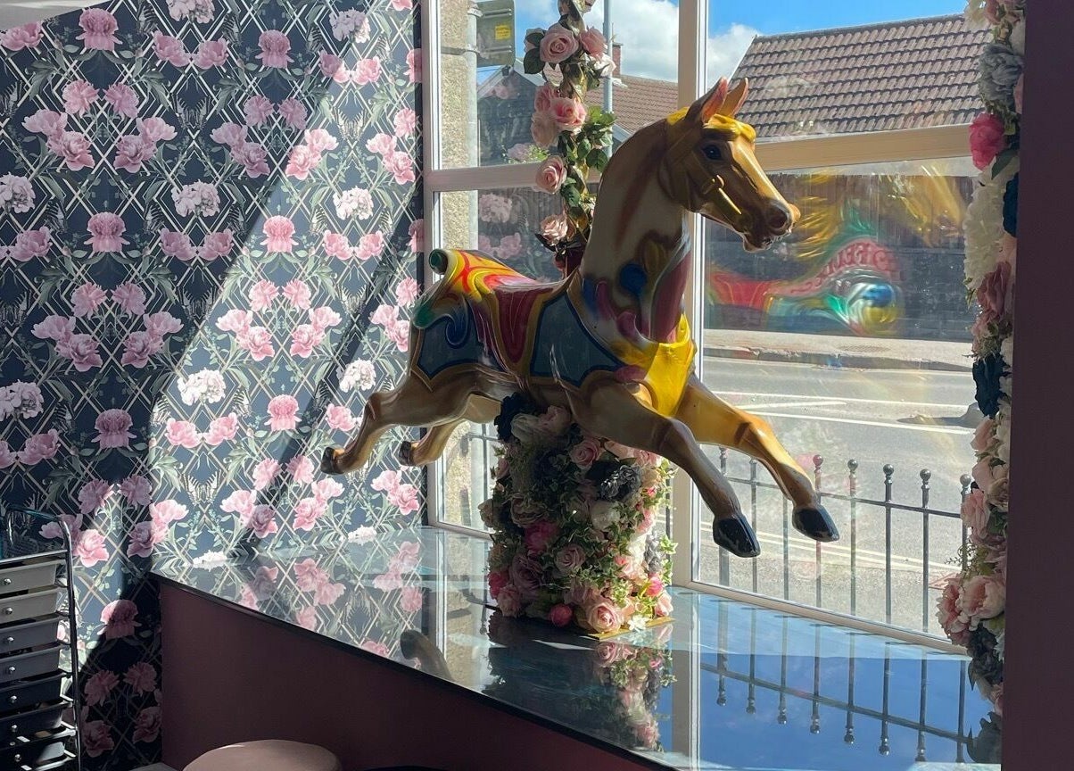 Vibrant carousel horse at Princess Glam and Locks, Roche Cornwall, St Austell, England, GB.