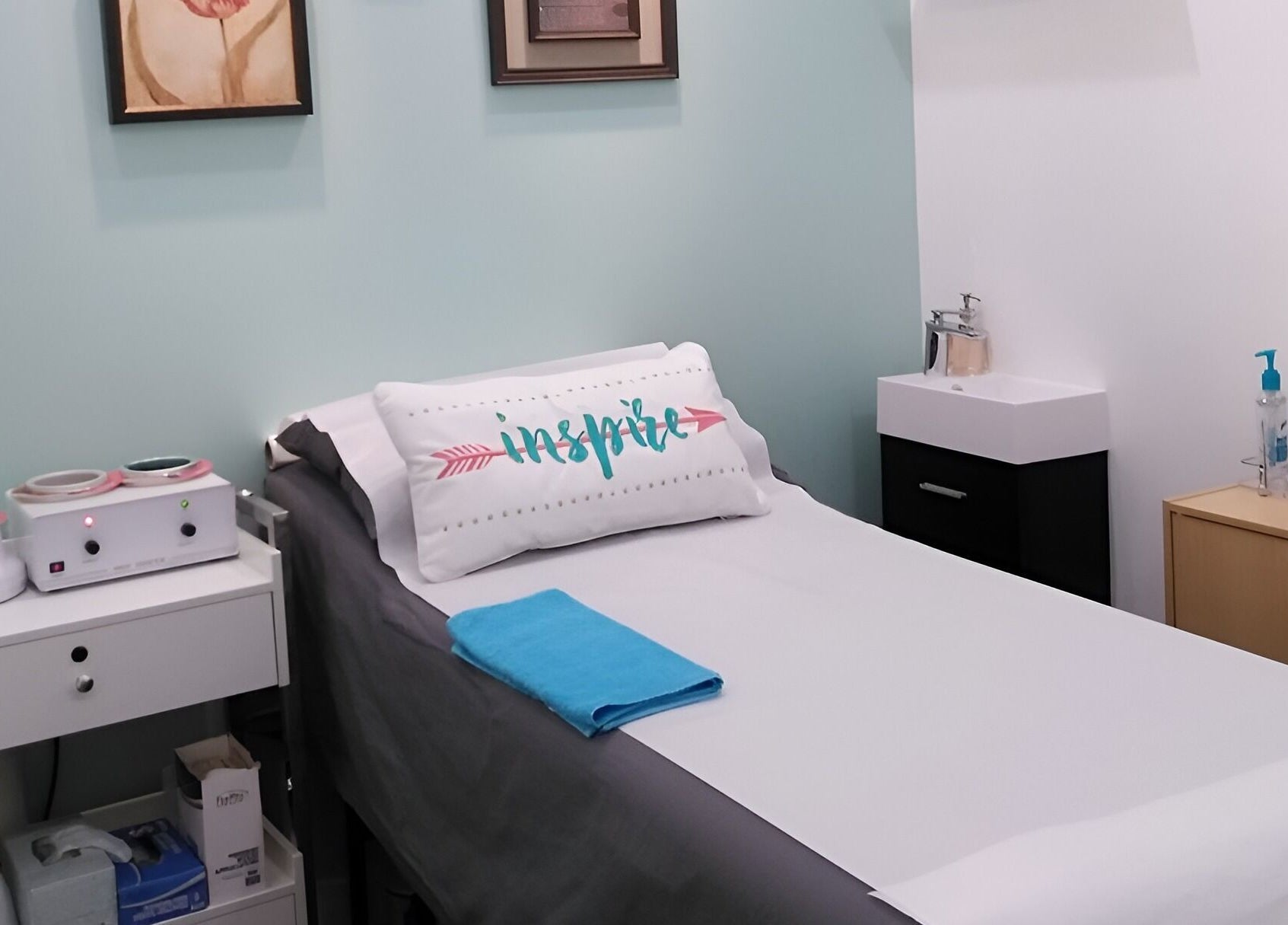 Relaxing treatment room at Liza's Skincare and Waxing Studio in Chicago, Illinois, US, featuring a cozy bed.