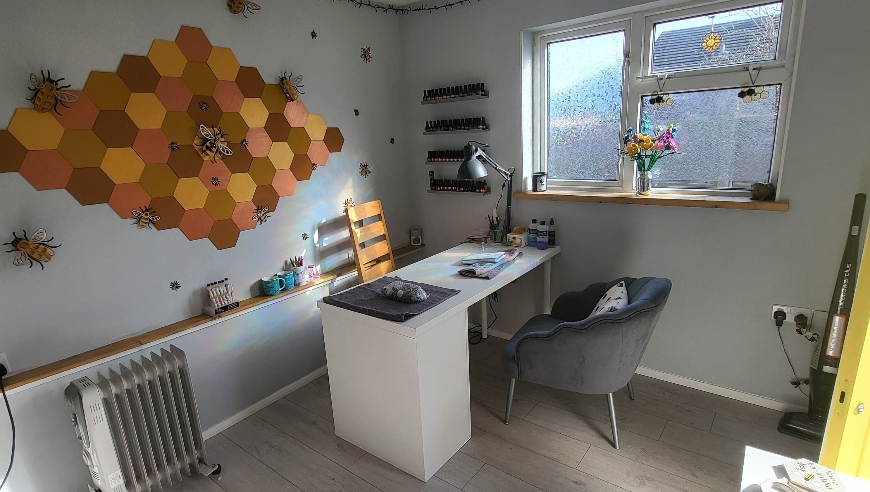 Cozy nail salon desk with beehive decor at CCB Nails and Beauty, Basingstoke, England, GB.