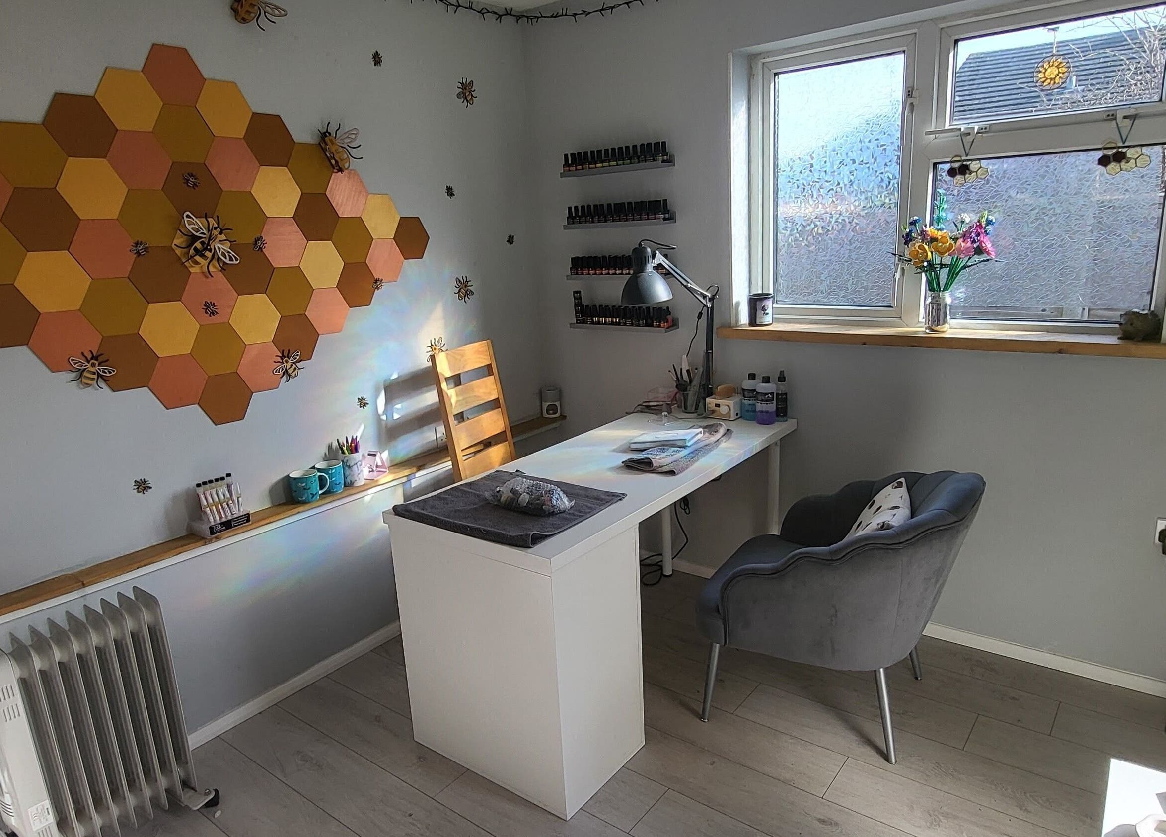 Cozy nail salon desk with beehive decor at CCB Nails and Beauty, Basingstoke, England, GB.