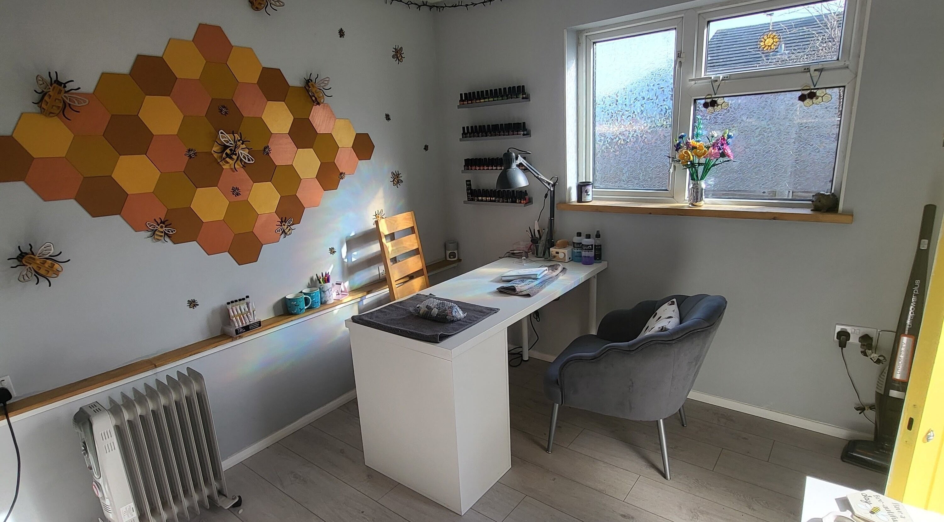 Cozy nail salon desk with beehive decor at CCB Nails and Beauty, Basingstoke, England, GB.
