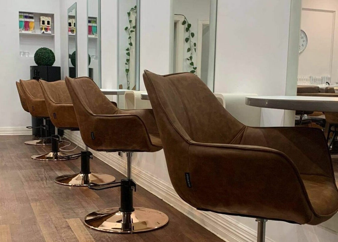 Stylish salon chairs at Floreat Hair in City of Nedlands, Western Australia, AU, creating a chic, inviting atmosphere.