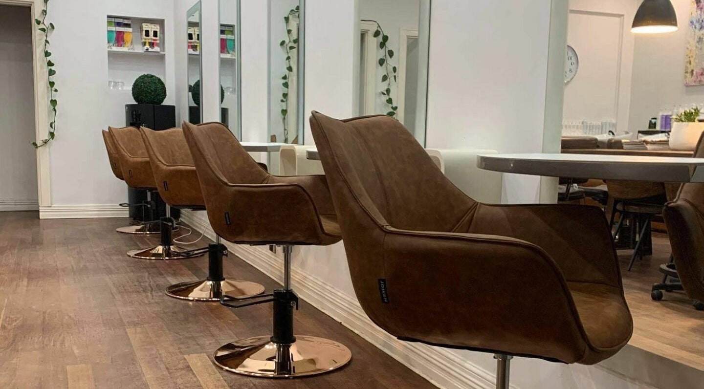 Stylish salon chairs at Floreat Hair in City of Nedlands, Western Australia, AU, creating a chic, inviting atmosphere.