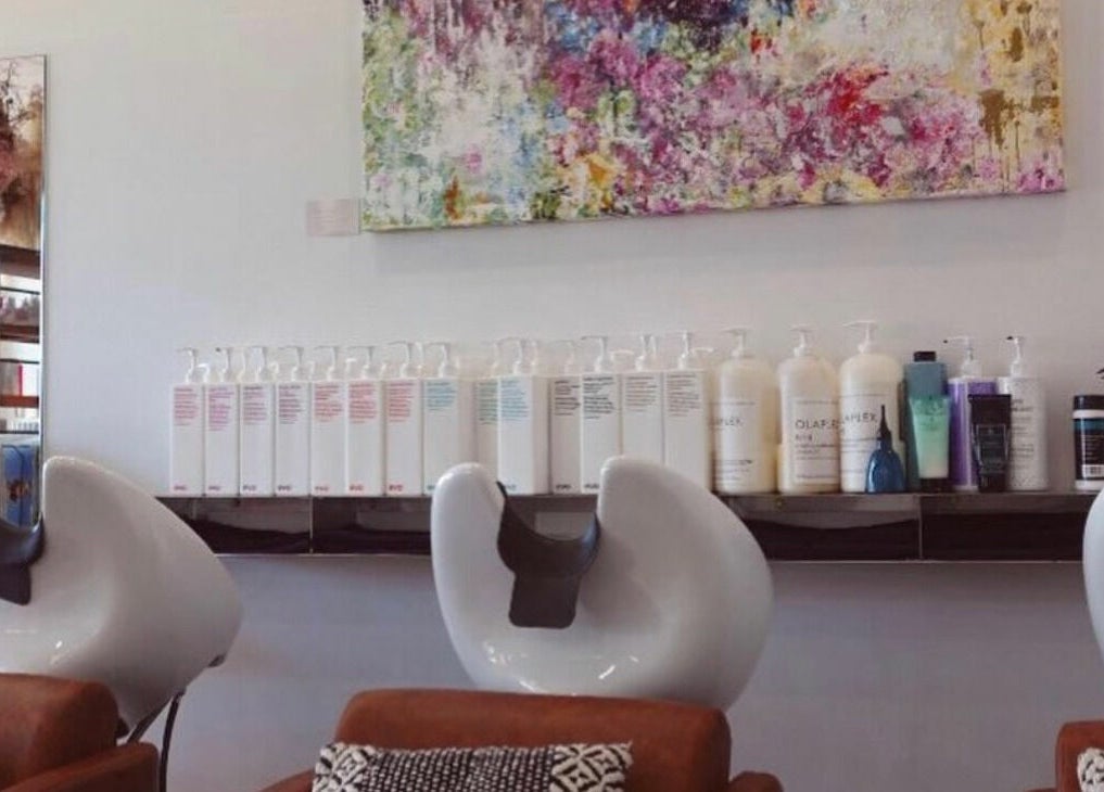 Stylish wash stations and vibrant wall art at Floreat Hair, City of Nedlands, Western Australia, AU.