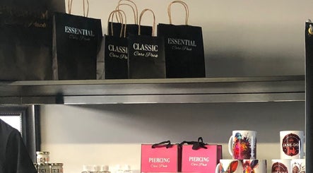 Care packs and mugs on shelf at Jane-Doe Ink Kramerville, Sandton, Gauteng, ZA.