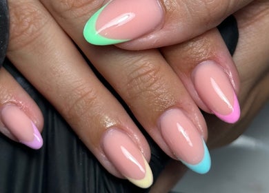 Colorful pastel nail art at AJ Beauty Studio, Hucknall, England, GB, showcasing expert manicuring skills.