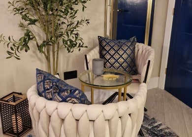 Relaxing seating area at Aesthetics Fifty Five, Wakefield, England, GB with plush chairs and decor.