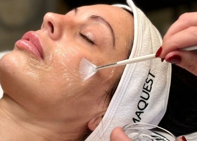 Facial treatment at Aesthetics Fifty Five, Wakefield, England, GB, showcasing expert skin care application.