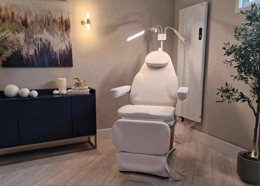 Elegant spa chair in serene room at Aesthetics Fifty Five, Wakefield, England, GB. Modern decor with natural elements.