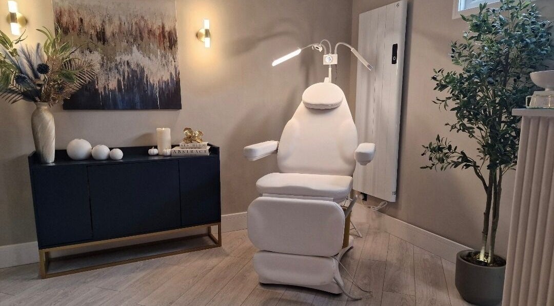 Elegant spa chair in serene room at Aesthetics Fifty Five, Wakefield, England, GB. Modern decor with natural elements.