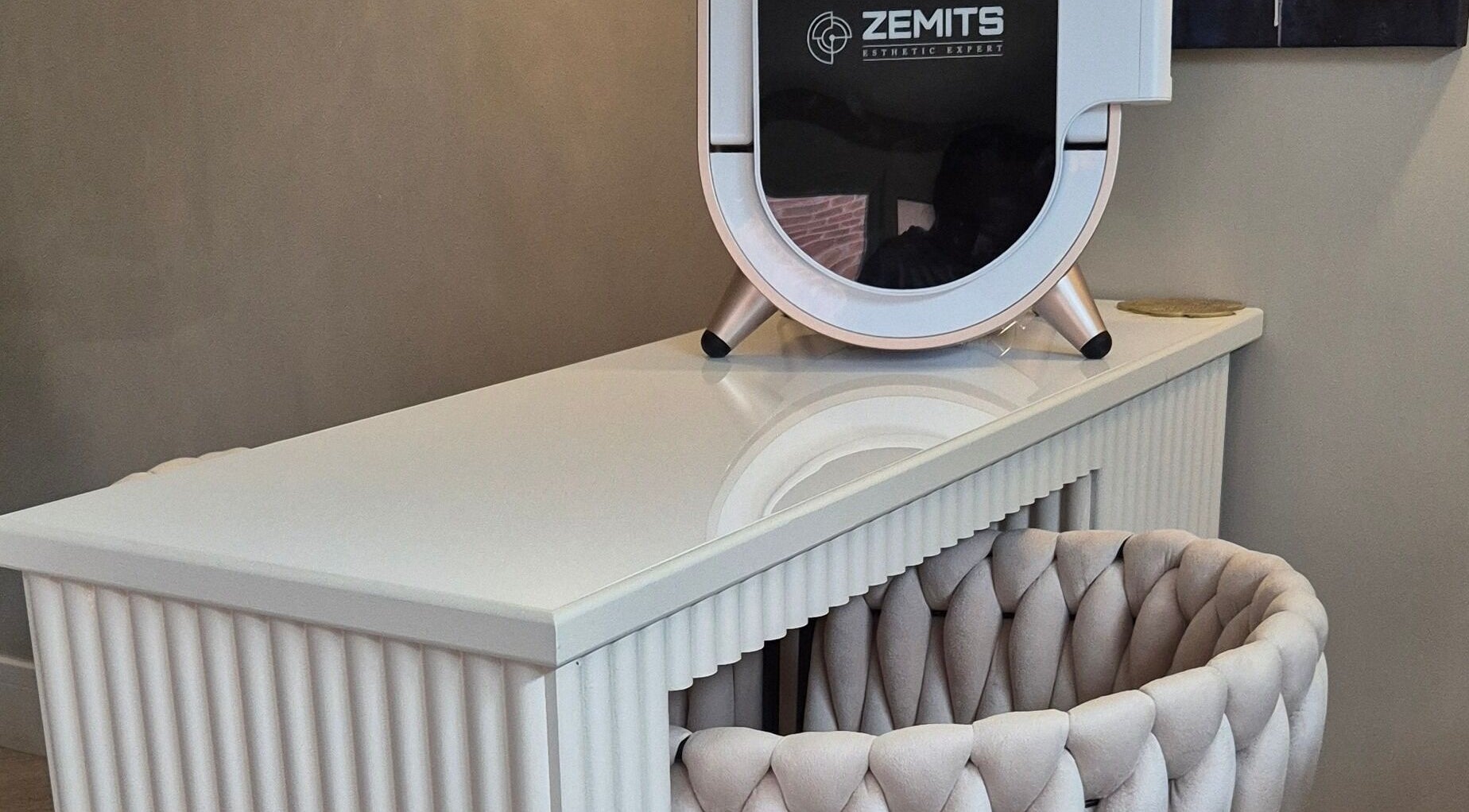 Elegant Zemits device on a white table at Aesthetics Fifty Five, Wakefield, England, GB.