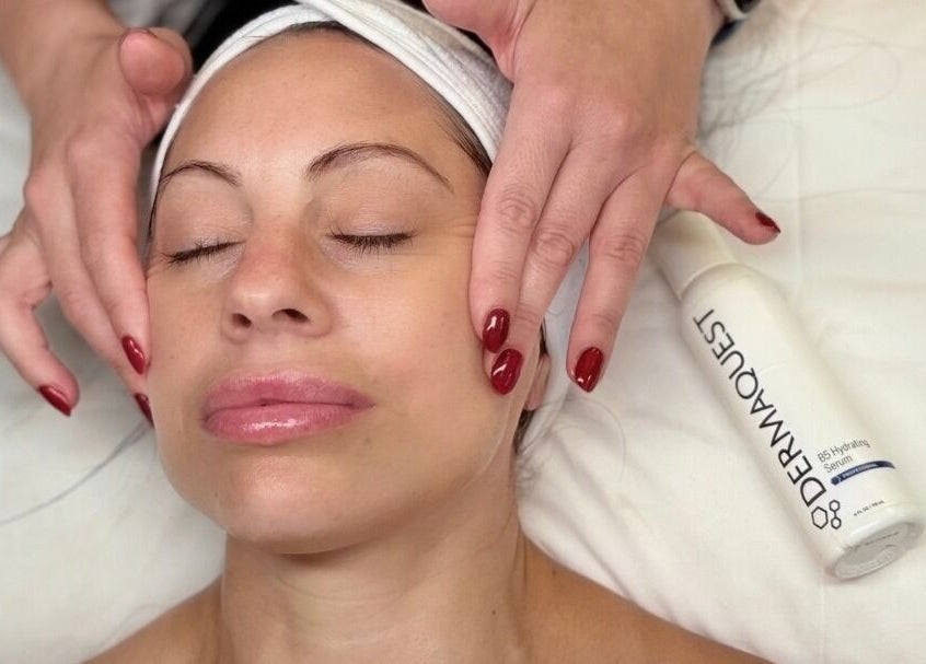 Relaxing facial treatment at Aesthetics Fifty Five, Wakefield, England, GB, highlighting expert skincare.
