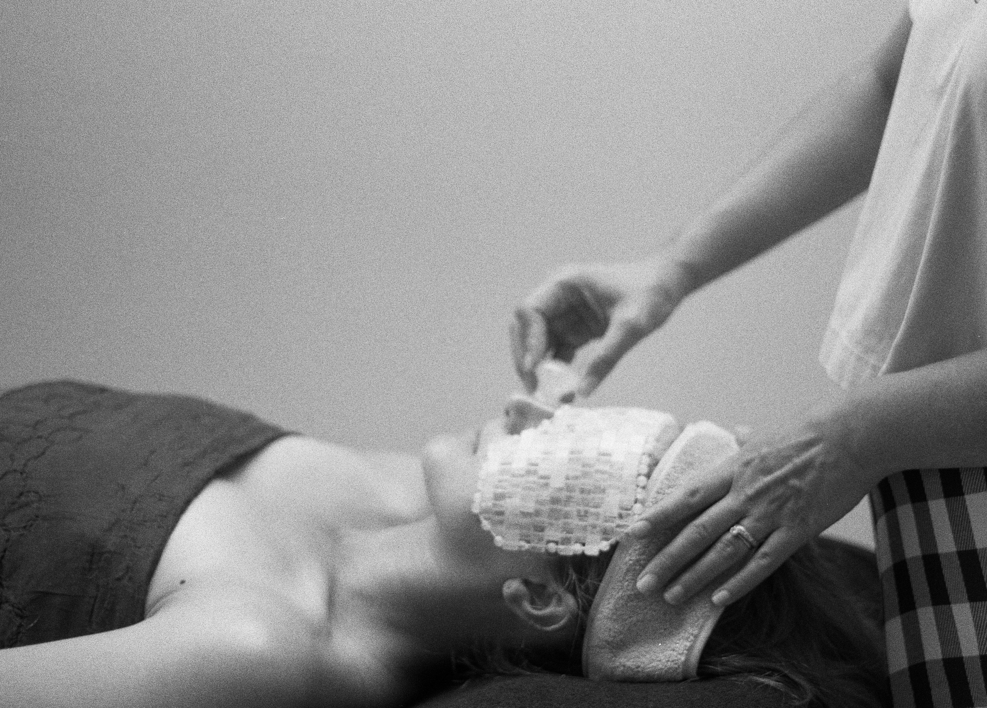 Client enjoys a soothing facial treatment at Rosehip Rituals, Whitstable, England, GB.