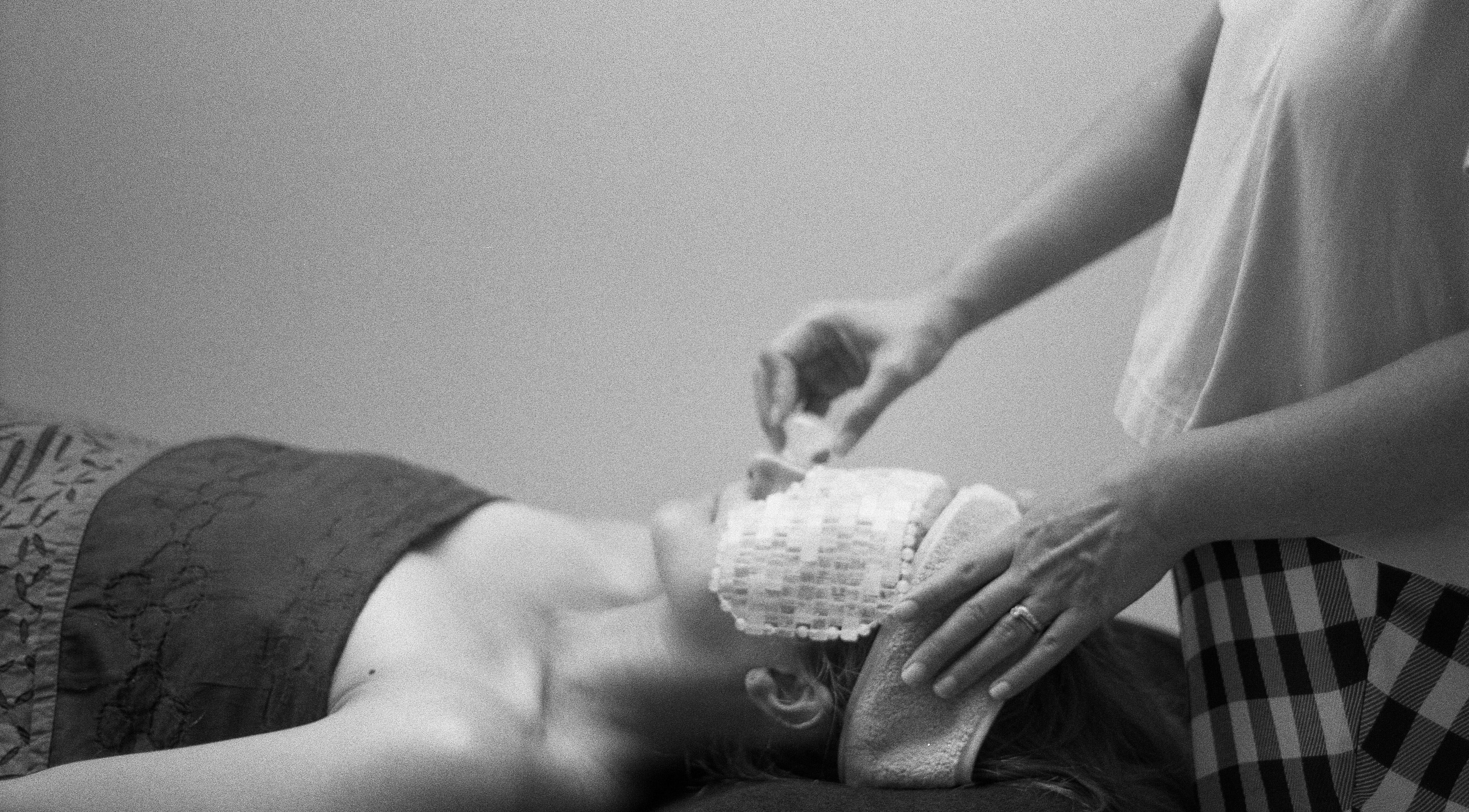 Client enjoys a soothing facial treatment at Rosehip Rituals, Whitstable, England, GB.